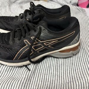 New Balance Black Athletic Shoes with Rose Gold Accents